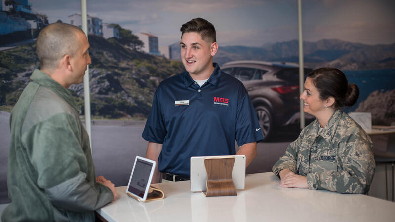 Military Autosource staff helping customers